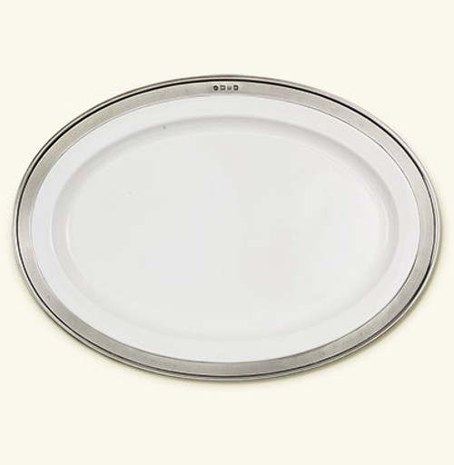 Oval platters are the efficiency experts when it comes to serving – smaller overall footprint, but as much (or more) serving space as their round counterparts. We offer three sizes of this elegant workhorse to accommodate a variety of needs, whether serving a holiday turkey, vegetables for a gathering, or camera-ready table service of your main course and sides.