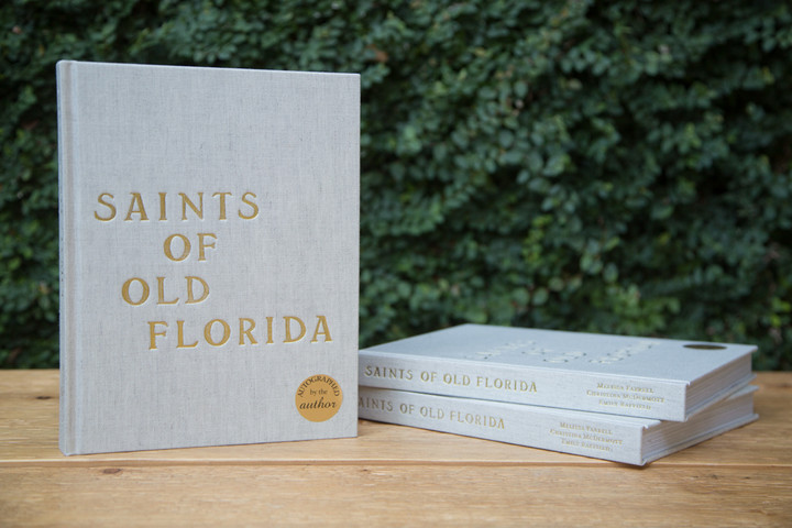 A collaboration between Melissa Farrell, Christina McDermott and Emily Raffield. We invite you to get lost in Old Florida, a place where a genuine essence of simplicity, adventure and community thrive. All of these saints are shared in Saints of Old Florida through personal stories, written contributions by area locals, meaningful recipes, vintage relics and authentic photography.A timeless book for those who love the coast. 252 full-color pages, on uncoated paper, natural linen cloth hardback cover. Custom, gold embossed cover art.
