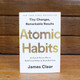 World-renowned habits expert James Clear has discovered a simpler system for transforming your life. He knows that lasting change comes from the compound effect of hundreds of small decisions – doing two push-ups a day, waking up five minutes early, or holding a single short phone call. He calls them atomic habits.

In this ground-breaking book, Clear reveals how these tiny changes will help you get 1 percent better every day. He uncovers a handful of simple life hacks (the forgotten art of Habit Stacking, the unexpected power of the Two Minute Rule, or the trick to entering the Goldilocks Zone), and delves into cutting-edge psychology and neuroscience to explain why they matter. Along the way, he tells inspiring stories of Olympic gold medalists, leading CEOs, and distinguished scientists who have used the science of small habits to stay productive, motivated, and happy.

These small changes will have a revolutionary effect on your career, your relationships and your life.