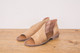 Brown 
Made with the finest Spanish craftsmanship and leather, this open toe shoe features side cutouts. Slight stacked heel. Fit: Runs true to size; if between sizes, size up.
