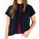 Navy/Red

This elevated staple with its sporty contrast stripe is already a customer favorite! Pair this season's gorgeous new colorways with everything from white jeans, a blazer tor an open cardigan. The blouse can also be worn off the shoulder for a stunning evening look. We recommend sizing down in this style.